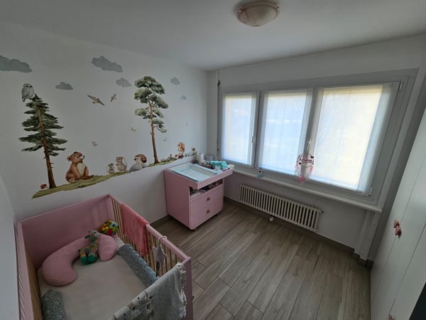 Elegante appartamento 5.5 locali con grandi spazi e zona tranquilla. 7
