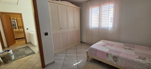 Elegante abitazione con ampio giardino, garage e caratteristico grottino 12