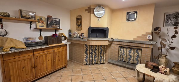 Elegante abitazione con ampio giardino, garage e caratteristico grottino 16
