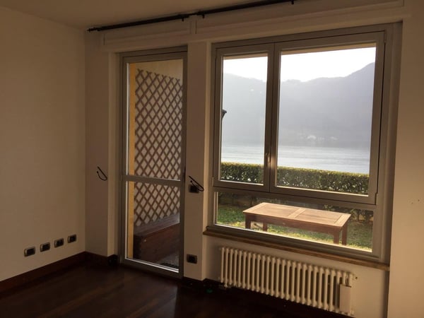 Pied-à-terre con vista lago giardino e piscina condominiale 2