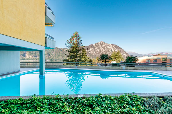 Pied-à-terre con vista lago giardino e piscina condominiale 10