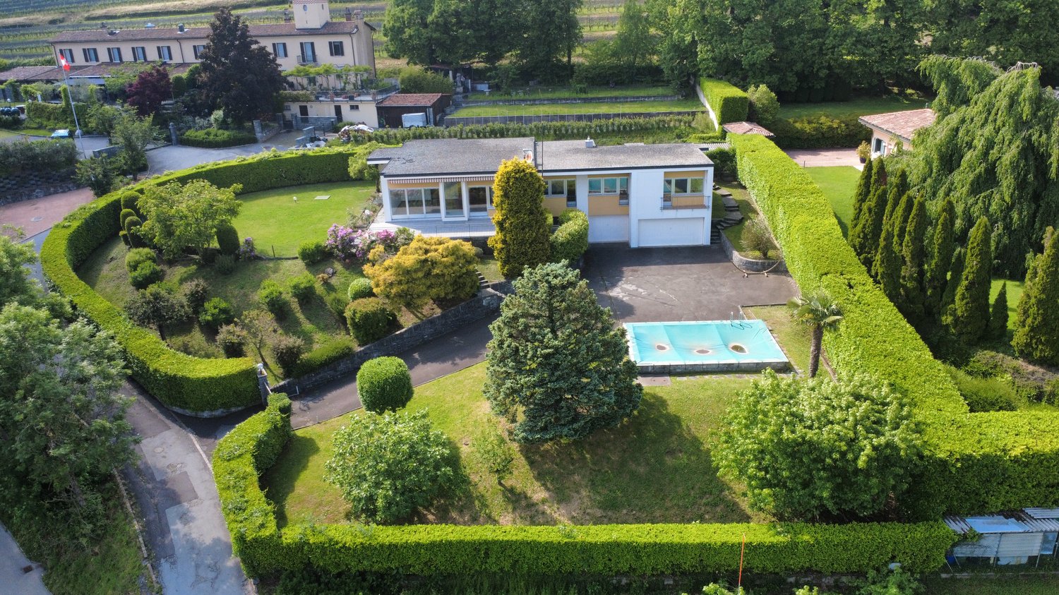 Two story house with garden and swimming pool, close to road, private entrance