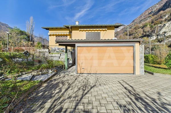 Einfamilienhaus mit separater Wohnung und grossem Garten 1