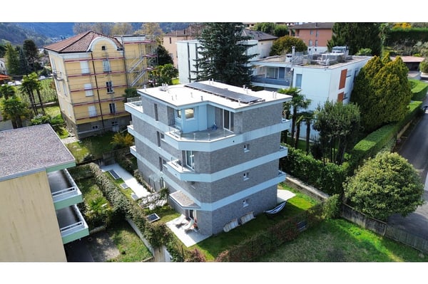 Nuovo e moderno appartamento duplex di 3 ½ locali con ampia terrazza e splendida vista 1