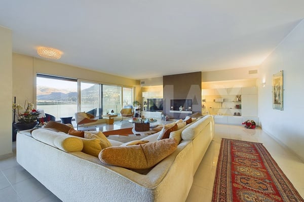 Attico signorile con vista imprendibile sul golfo di Lugano anche come residenza secondaria