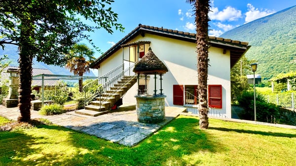 rif. 2018 CASA BIFAMILIARE TICINESE-GRANDE POTENZIALE NEL VERDE CON BOX AUTO 3