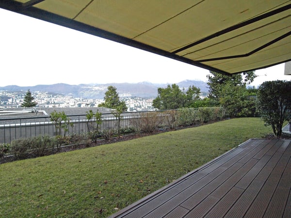 3775 - LUMINOSO AMPIO APPARTAMENTO CON GIARDINO E VISTA APERTA 1