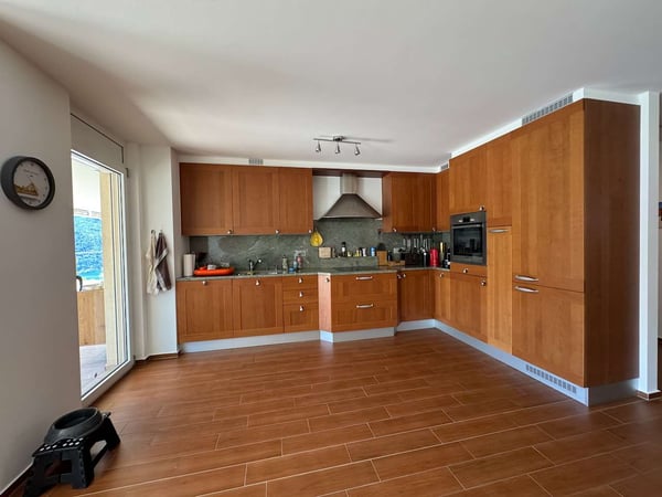 Attico panoramico con ampia terrazza e vista lago 10