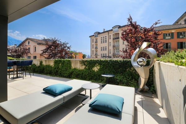 MURALTO - Moderno appartamento con giardino in centro città 31