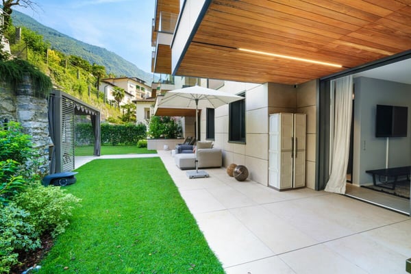 MURALTO - Moderno appartamento con giardino in centro città 35