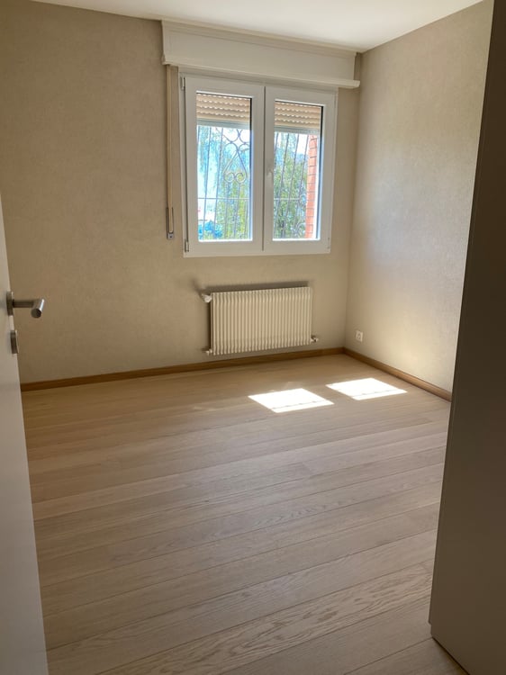 Appartement de 4.5 pièces au rez inférieur avec jardin - Route des 5