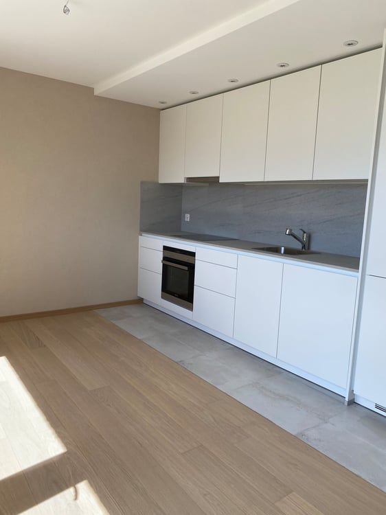 Appartement de 4.5 pièces au rez inférieur avec jardin - Route des 10