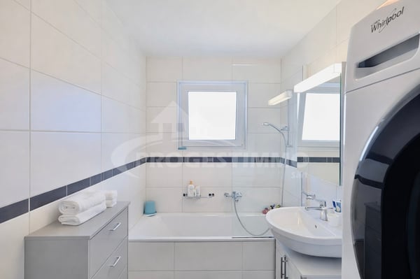EXCEPTIONNEL APPARTEMENT 4.5 PIÈCES DANS UN ENVIRONNEMENT PAISIBLE 7