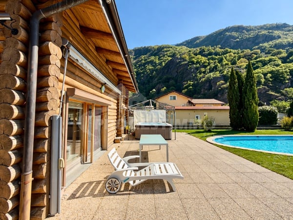 MAISON INDIVIDUELLE D'EXCEPTION EN RONDINS DE BOIS 11