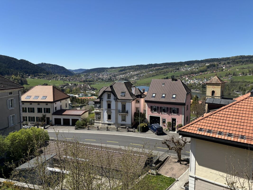 Bel immeuble familial avec terrasse et jardin