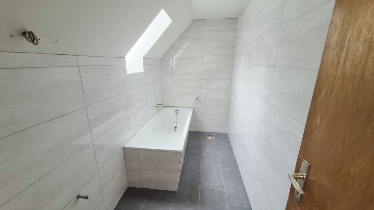 Chaleureux logement de 2.5 pièces, cuisine et salle de bains neuves - 1er loyer offert