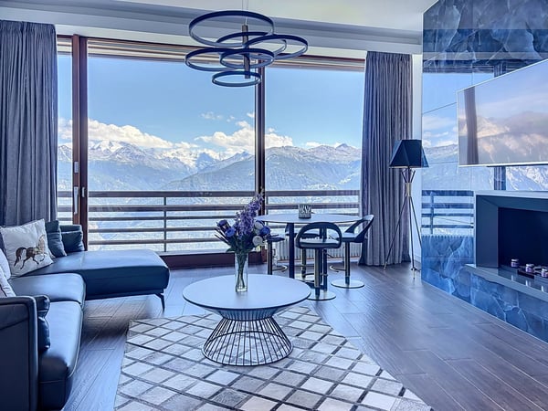 Deux magnifiques appartements de standing reliés avec une vue panoramique sur les Alpes
