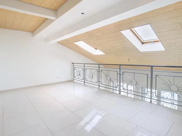 Duplex en attique avec terrasse au centre-ville 9