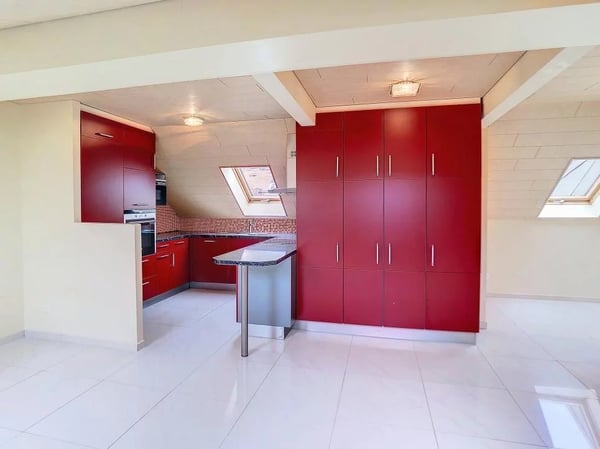 Duplex en attique avec terrasse au centre-ville 11