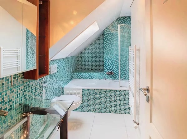 Duplex en attique avec terrasse au centre-ville 12