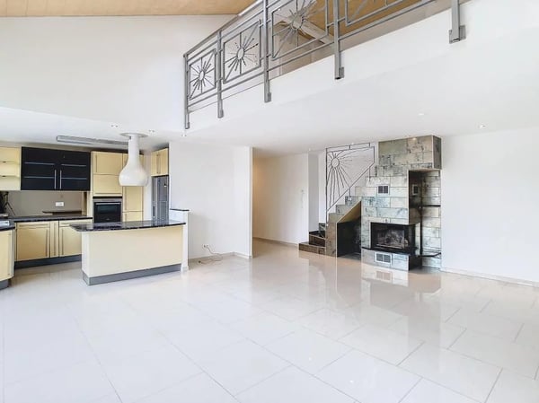 Duplex en attique avec terrasse au centre-ville 1