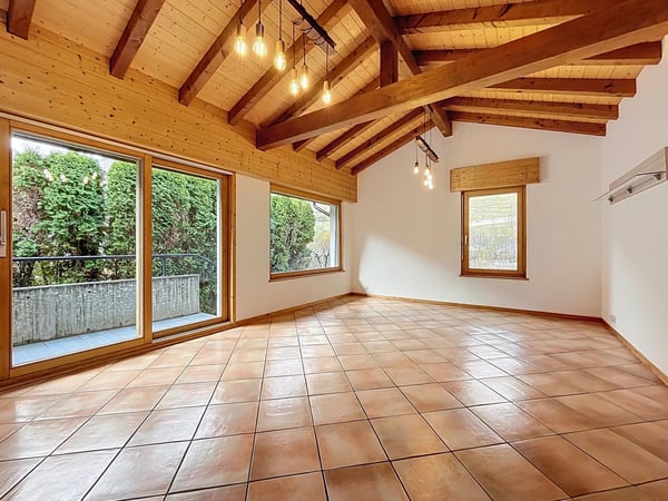 Appartement en rez-de-chaussée surélevé avec jardin 2