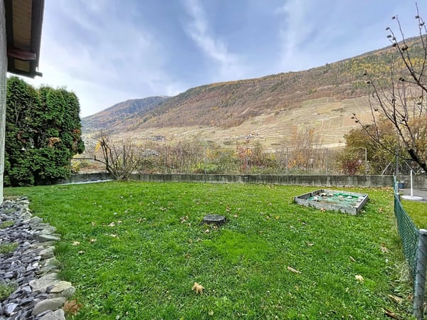 Appartement en rez-de-chaussée surélevé avec jardin 12