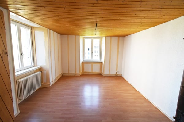 Immeuble de rendement net 6,12 % avec chauffage à distance. 7