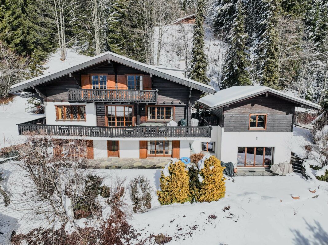 Three-story chalet in the residential complex with panoramic views of the Alps.