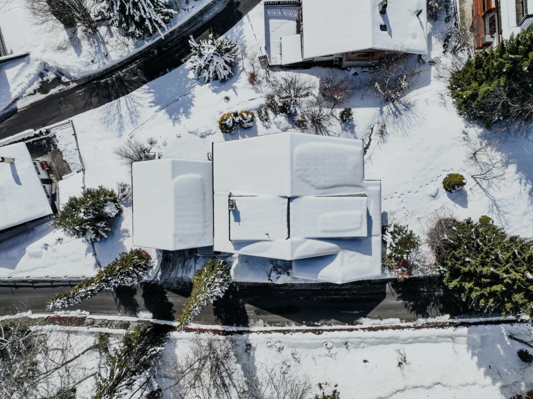 Three-story chalet in the residential complex with panoramic views of the Alps.