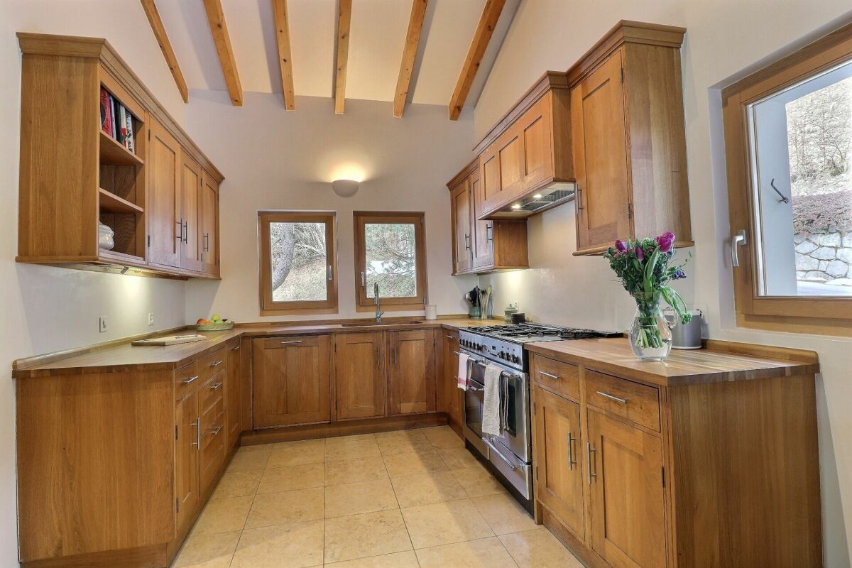 Three-story chalet in the residential complex with panoramic views of the Alps.