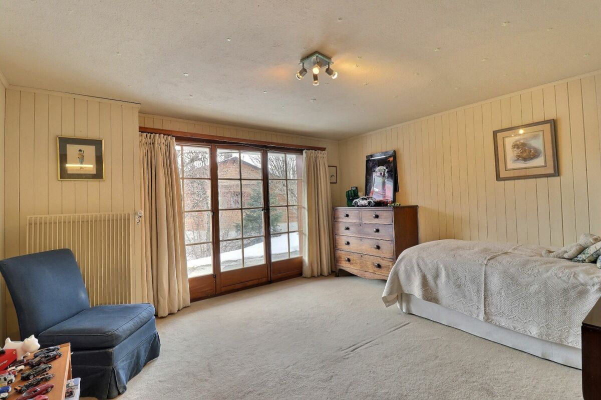 Three-story chalet in the residential complex with panoramic views of the Alps.