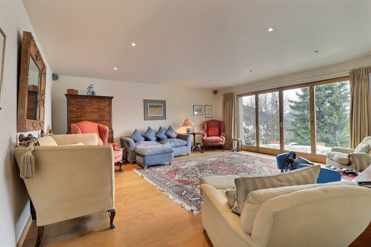 Three-story chalet in the residential complex with panoramic views of the Alps.
