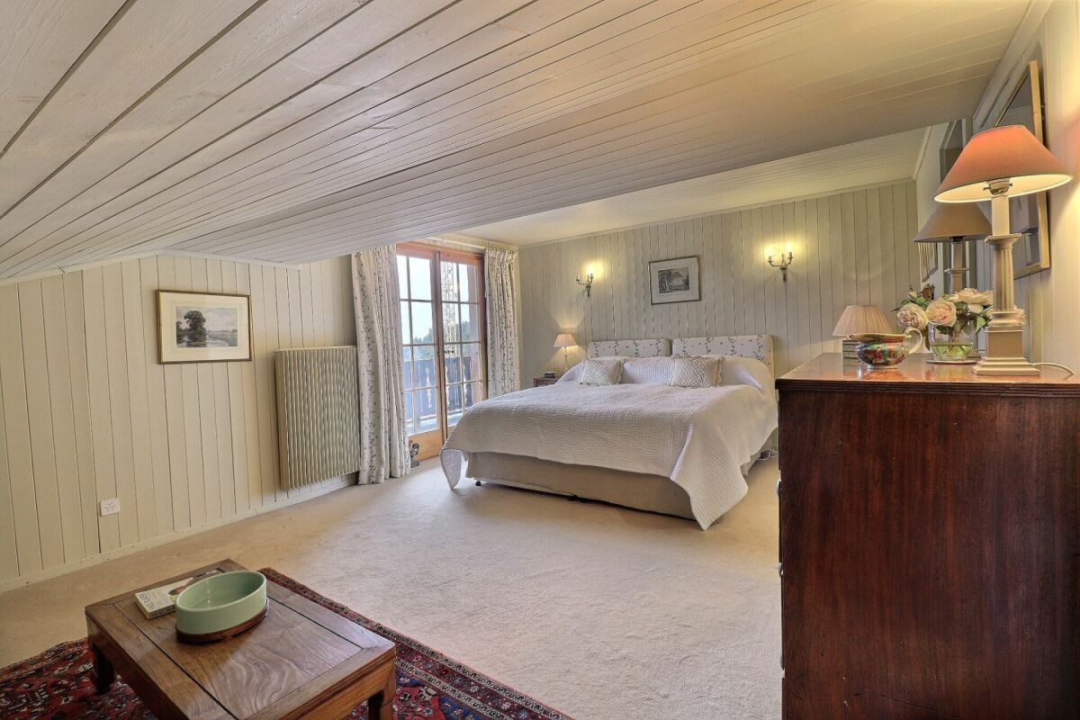 Three-story chalet in the residential complex with panoramic views of the Alps.