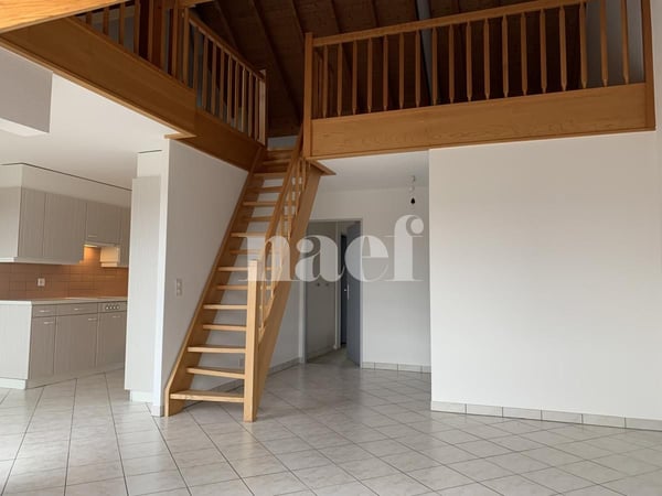 Spacieux appartement de 4.5 pièces avec balcon et grande mezzanine dans les combles 2