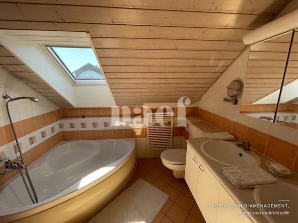 Au centre du village- Bel appartement de 5.5 pièces dans les combles avec cheminée et grand balcon 8