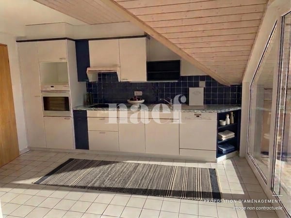 Au centre du village- Bel appartement de 5.5 pièces dans les combles avec cheminée et grand balcon 2