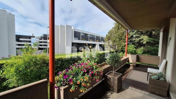 Appartement de 5.5 pièces au rez-de-chaussée avec cheminée et balcon 1