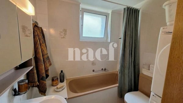 Appartement de 5.5 pièces au rez-de-chaussée avec cheminée et balcon 8