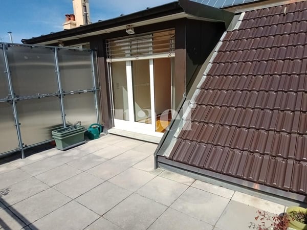 Magnifique attique avec terrasse au pied du parc Bertrand 9