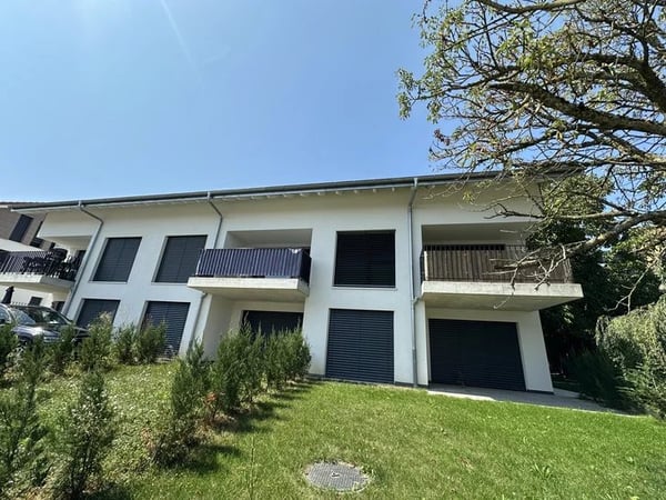 Appartement de 3.5 pièces au rez-de-chaussée avec jardin privatif 1
