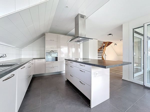 Duplex 4.5 pièces au dernier étage avec vue sur le Léman, les Alpes et les vignobles 3