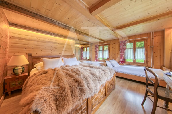 A VENDRE APPARTEMENT 5.5 PIECES  DANS UN CHALET AUTHENTIQUE 10
