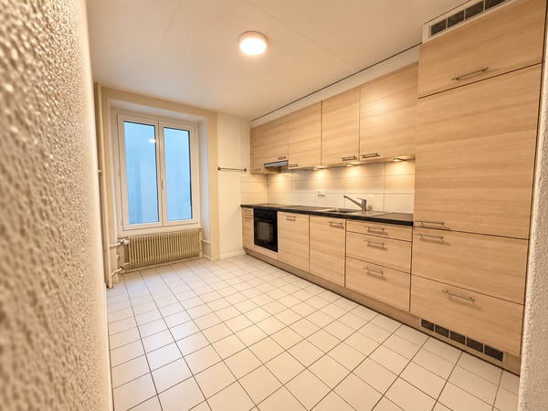 Charmant appartement de 3 pièces à Neuchâtel – Rez-de-chaussée surélevé avec balcon 1