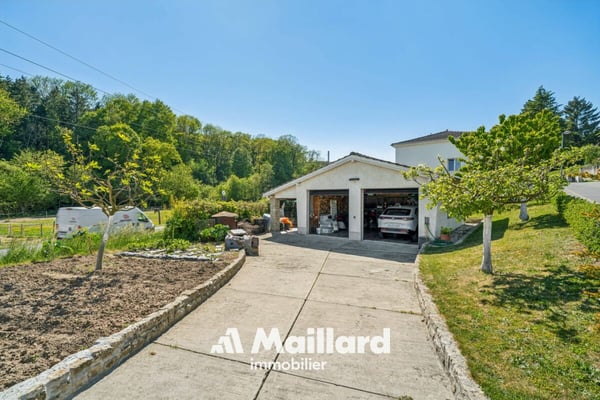 Potentiel de rendement - Maison individuelle avec deux appartements de 3.5 pièces et atelier et places de parc 18