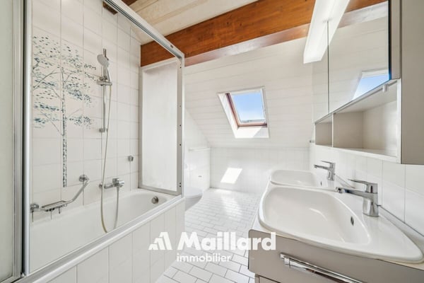 Un appartement familial aux volumes généreux au coeur du Vieux Bourg de Gland 9