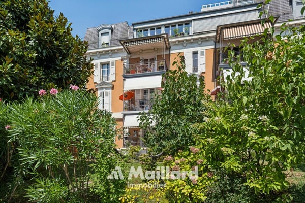 Appartement de caractère avec jardin privatif au coeur de Lausanne 12