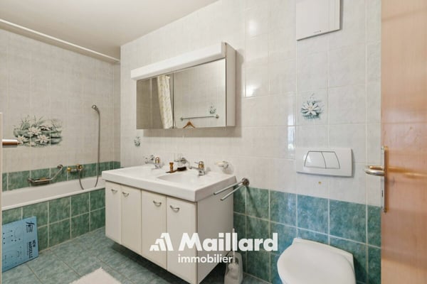 Spacieux et lumineux appartement de 5.5 pièces idéalement situé avec belles échappées sur le lac 12