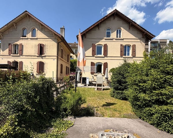 Charme et authenticité: ancienne villa Suchard avec jardin et garage 1