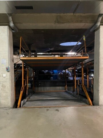 Places de parc intérieures sur lift au centre-ville de Sierre 1